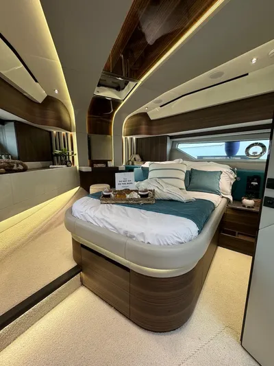 4 Stateroom Layout Yacht Photos Pics Luxurious bedroom interior of 2024 Aicon 66 Vivere yacht with modern design and ambient lighting.