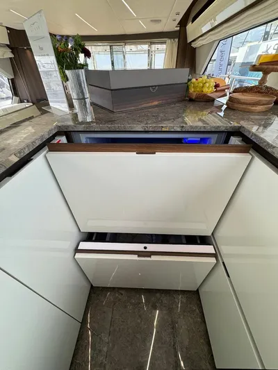 4 Stateroom Layout Yacht Photos Pics Luxurious interior of 2024 Aicon 66 Vivere yacht with modern kitchen design.