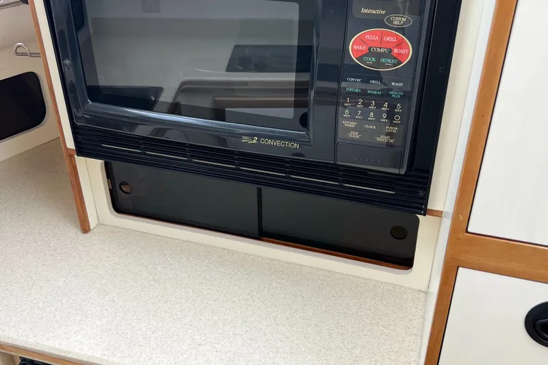  Yacht Photos Pics Microwave in 2004 Albin 35 Tournament Express boat kitchen area.