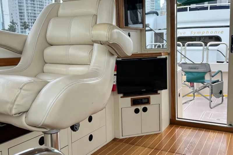  Yacht Photos Pics Interior of 2004 Albin 35 Tournament Express with leather seating and TV.