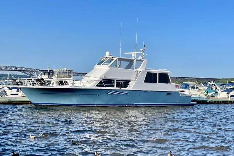 Coming To Fort Lauderdale By Nov. 3 Yacht Photos Pics 1999 Viking Cockpit Sports Yacht docked in marina, clear blue sky background.