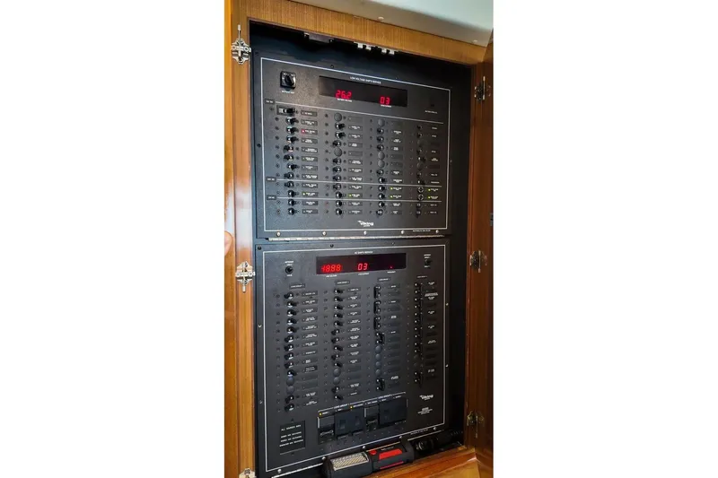 Coming To Fort Lauderdale By Nov. 3 Yacht Photos Pics Control panel inside 1999 Viking Cockpit Sports Yacht, featuring switches and digital displays.