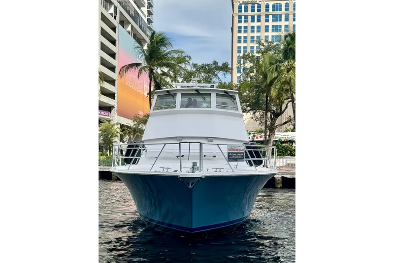 Least Expensive In The World Yacht Photos Pics 1999 Viking Cockpit Sports Yacht docked in urban marina setting.