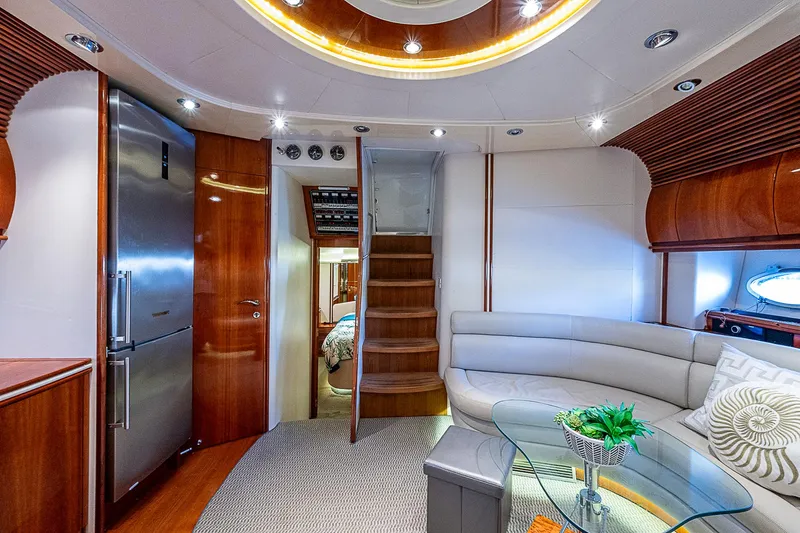  Yacht Photos Pics Luxurious interior of 2000 Pershing 65 Limited yacht with modern furnishings and elegant design.
