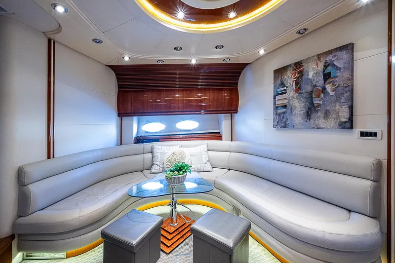  Yacht Photos Pics Luxurious interior of 2000 Pershing 65 Limited yacht with elegant seating and modern decor.