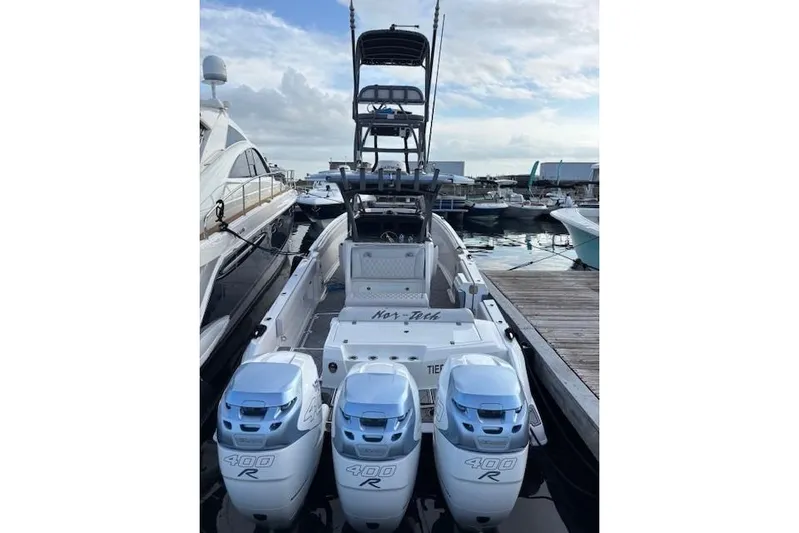 My Mermaid Yacht Photos Pics 2020 Nor-Tech 390 Sport Center Console boat with triple 400R engines docked at marina.
