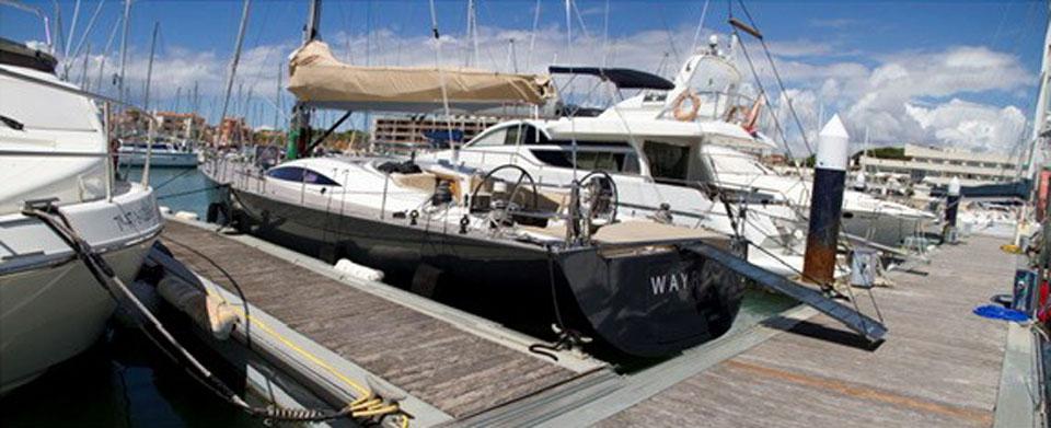 Sailing yacht Comar Comet 62 RS, 2007 model, docked at a marina.