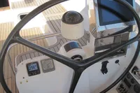Steering wheel and navigation instruments on 2007 Comar Comet 62 RS yacht.