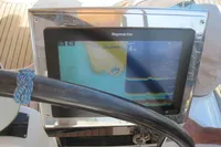 Raymarine navigation display on 2007 Comar Comet 62 RS yacht, showing nautical map and depth.