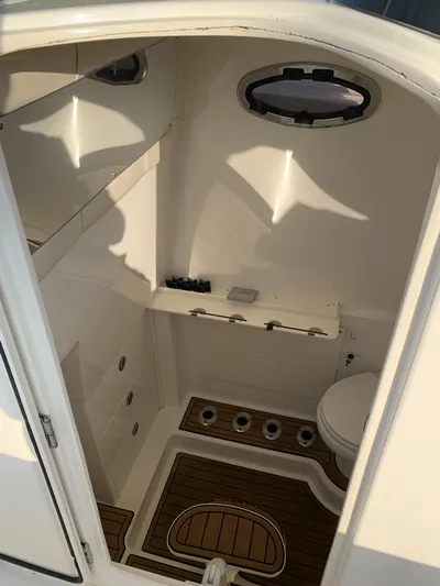 Reel Tree-mendous Yacht Photos Pics 2016 Key West 351 Billistic boat interior cabin with wooden flooring.
