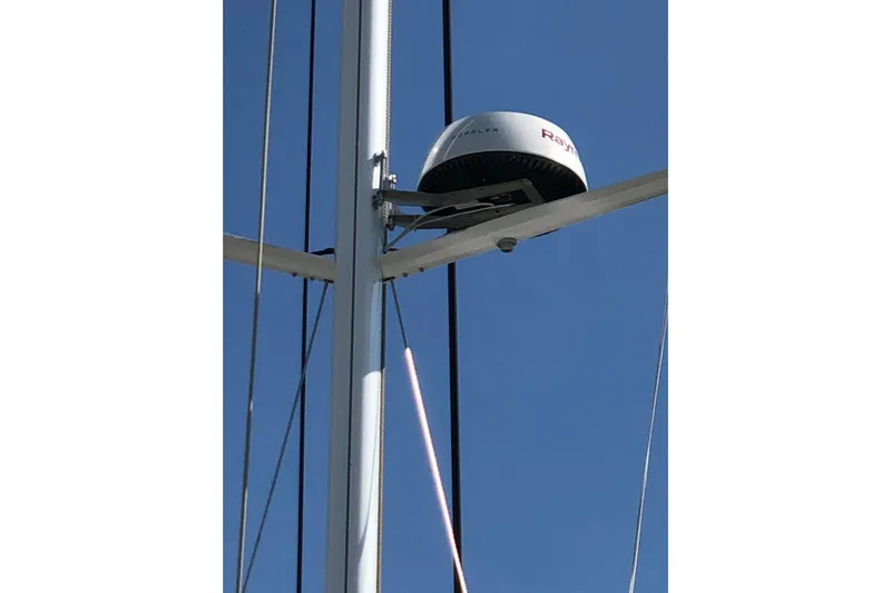 Build No.31 Yacht Photos Pics Radar equipment on X-Yachts 4.6 sailboat mast, 2021 model, against clear blue sky.