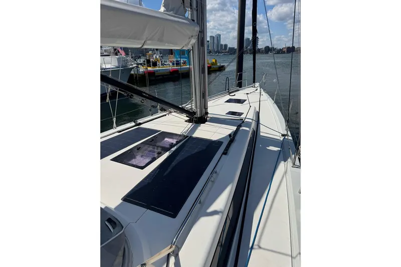 Build No.31 Yacht Photos Pics 2021 X-Yachts 4.6 sailboat docked, showcasing sleek deck design and modern features.
