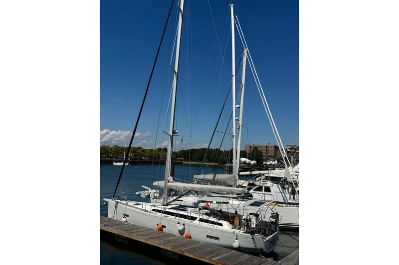 Build No.31 Yacht Photos Pics 2021 X-Yachts 4.6 sailboat docked at marina under clear blue sky.