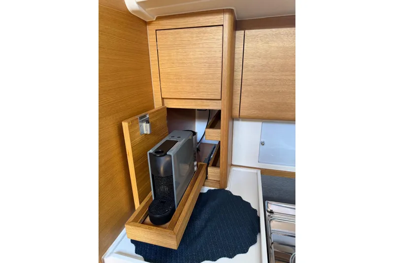 Build No.31 Yacht Photos Pics Modern kitchen area in 2021 X-Yachts 4.6 with built-in coffee machine.