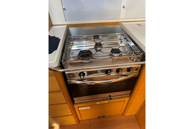 Build No.31 Yacht Photos Pics Modern yacht kitchen with stainless steel stove and oven, X-Yachts 4.6, 2021 model.