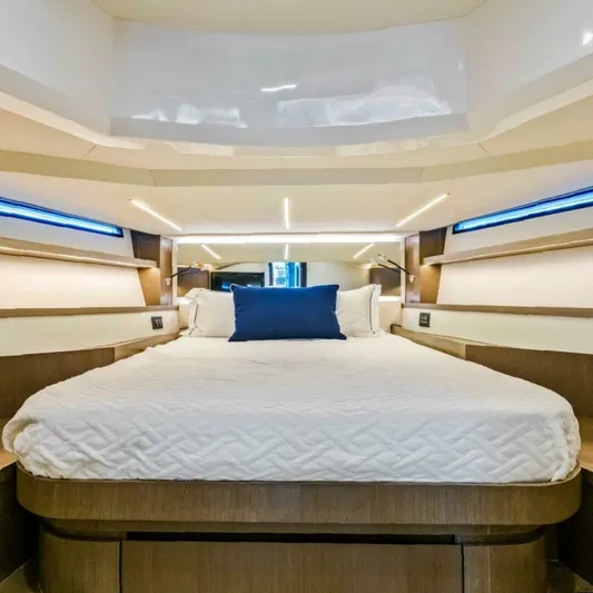  Yacht Photos Pics Luxurious cabin interior of 2025 OKEAN 57 yacht with modern design and cozy bedding.
