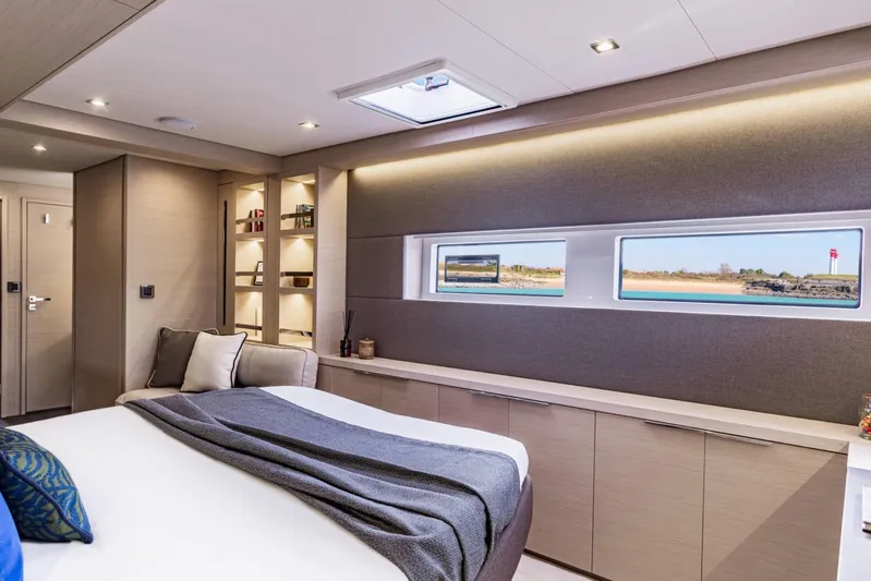  Yacht Photos Pics Luxurious interior of 2026 Lagoon 55 yacht with modern design and scenic window views.
