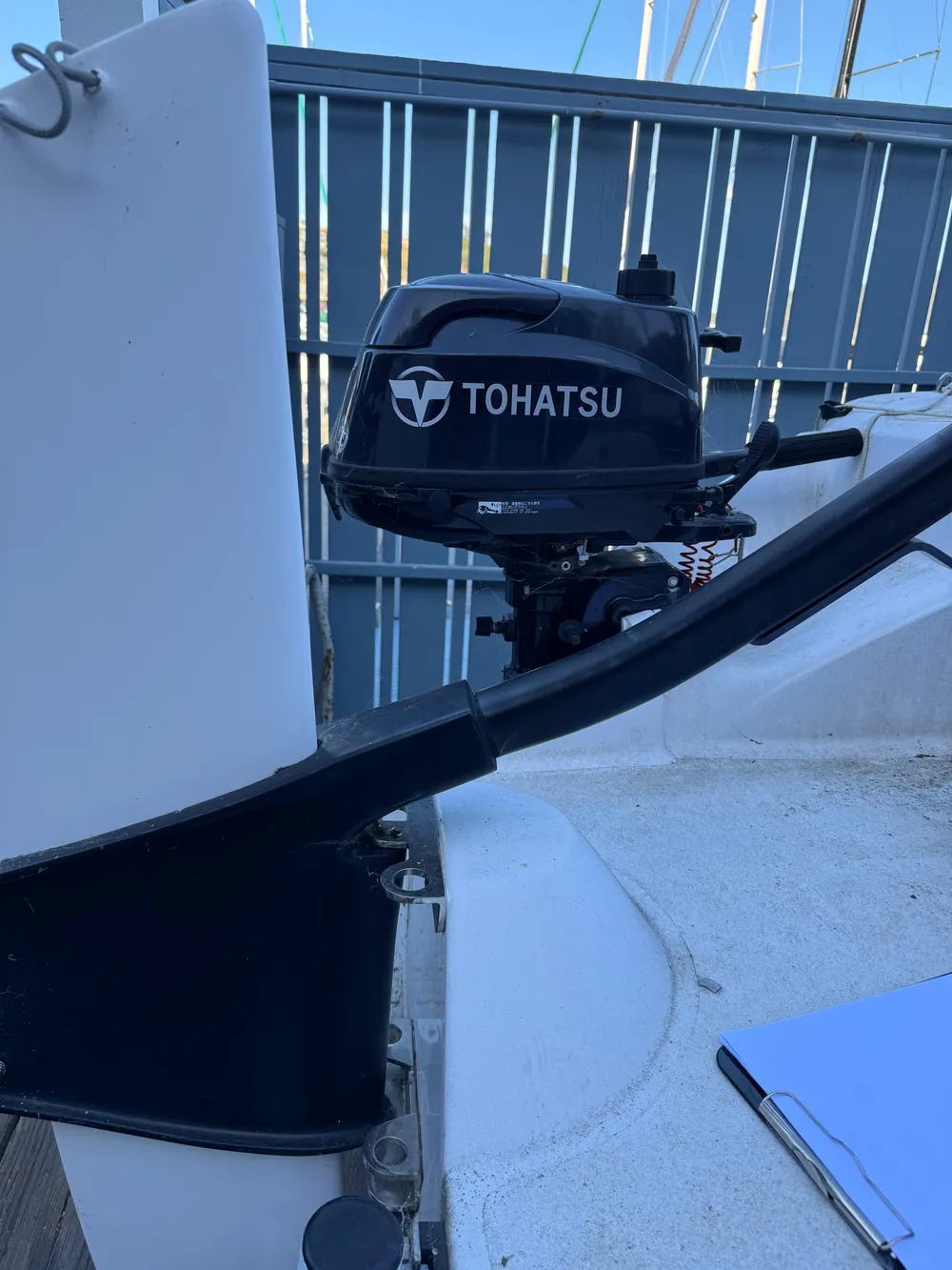 Tohatsu outboard motor on 2018 Corsair 760 Sport boat deck.