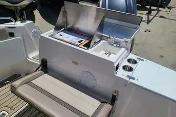  Yacht Photos Pics 2023 Cutwater C-248 Coupe boat interior with seating and storage area.