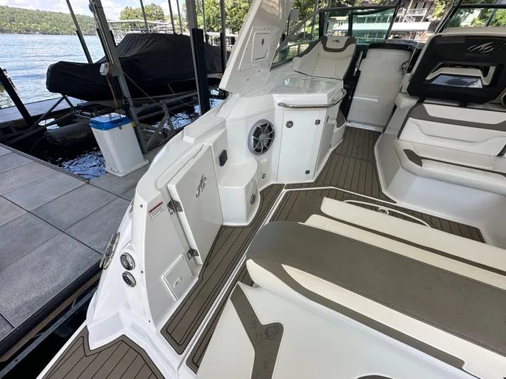  Yacht Photos Pics 2017 Monterey 355 Sport Yacht interior with seating and dock view.
