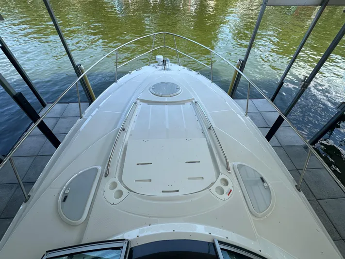  Yacht Photos Pics 2017 Monterey 355 Sport Yacht docked, showcasing sleek deck design and railing.