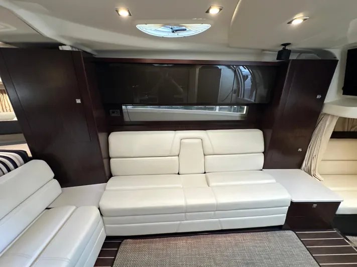  Yacht Photos Pics Luxurious interior of 2017 Monterey 355 Sport Yacht with white leather seating.