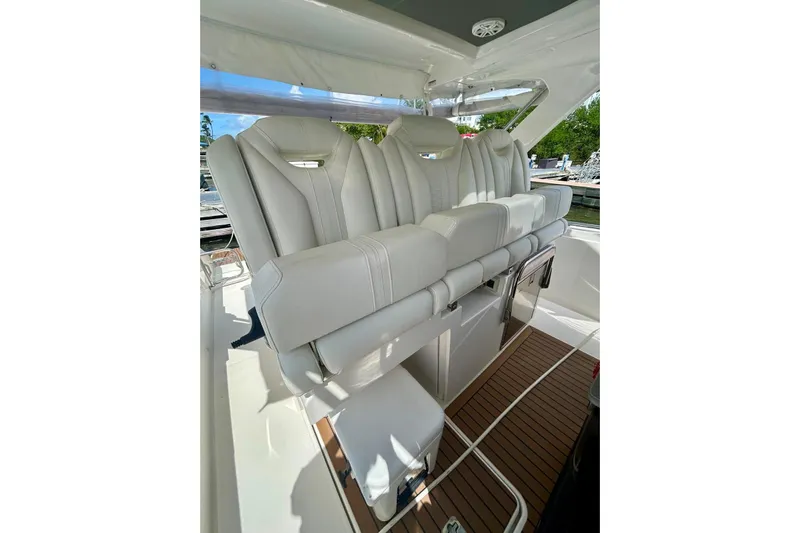  Yacht Photos Pics Luxurious seating on 2021 Tiara Yachts 34 LS, featuring elegant white upholstery.