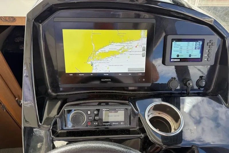 Pisces Yacht Photos Pics Dashboard of 2021 Jeanneau NC 895 with Garmin and Yamaha navigation systems.