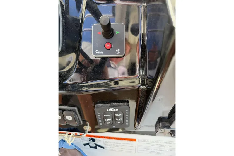 Pisces Yacht Photos Pics Control panel of 2021 Jeanneau NC 895 boat with switches and buttons.