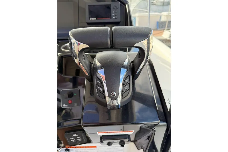 Pisces Yacht Photos Pics Throttle controls on a 2021 Jeanneau NC 895 boat dashboard.