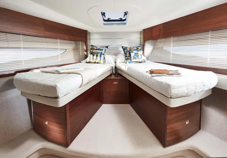  Yacht Photos Pics Luxurious 2025 Princess V50 Open yacht cabin with twin beds and modern decor.