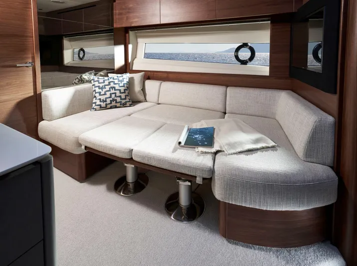  Yacht Photos Pics Luxurious interior of 2025 Princess V50 Open yacht with elegant seating and modern decor.