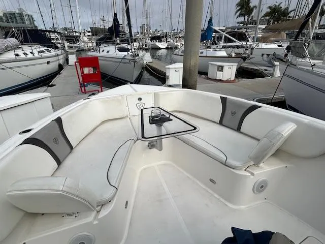 Dolce Vita Yacht Photos Pics 2016 Century 3200 Center Console boat with spacious seating at marina.