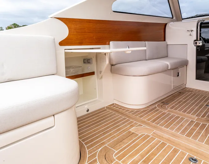 Penrose Yacht Photos Pics Luxurious interior of 2020 Gagliotta Lobster 35 yacht with elegant seating and wood accents.