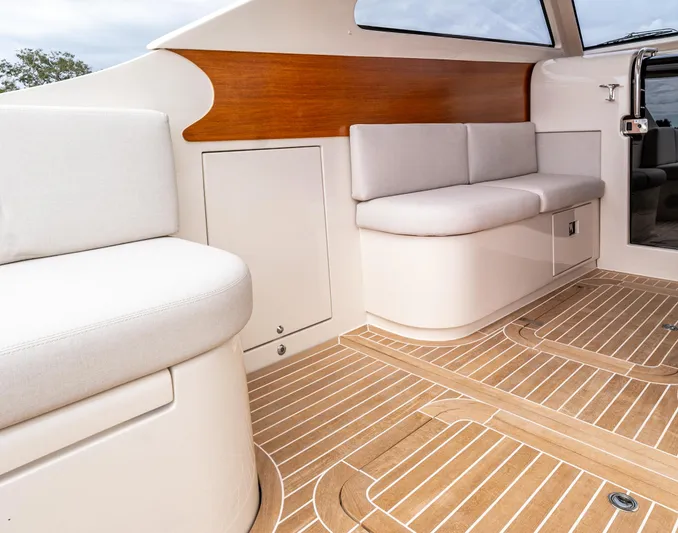 Penrose Yacht Photos Pics Luxurious interior of 2020 Gagliotta Lobster 35 yacht with elegant seating and wood accents.