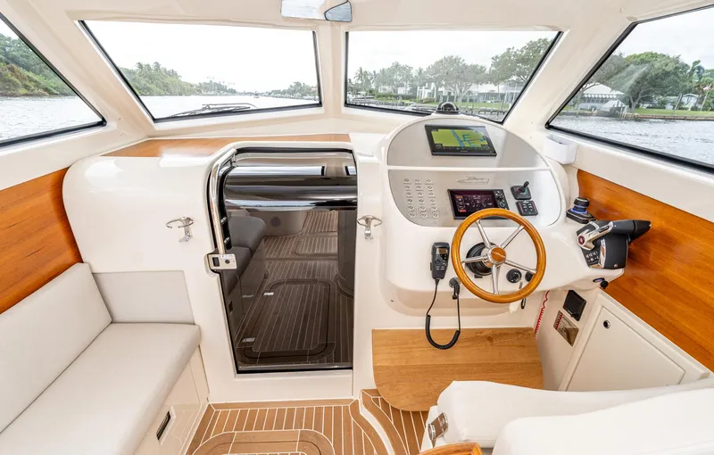 Penrose Yacht Photos Pics Interior of 2020 Gagliotta Lobster 35 boat with modern helm and wooden accents.