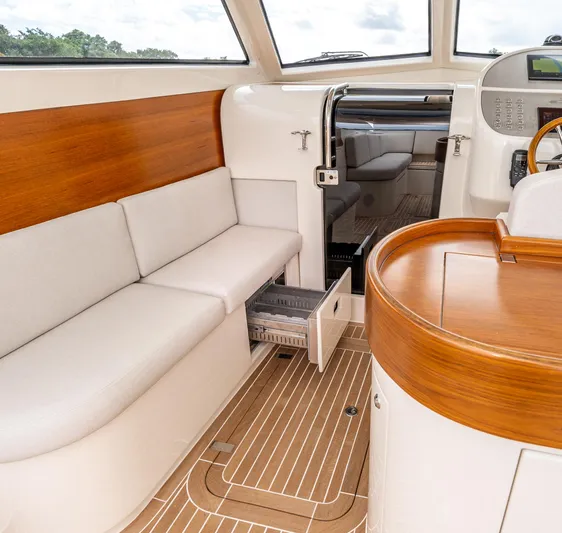 Penrose Yacht Photos Pics Interior of 2020 Gagliotta Lobster 35 yacht with wooden accents and seating.