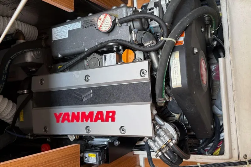 Picture Perfect Yacht Photos Pics Yanmar engine in a 2022 Catalina 425 sailboat, showcasing detailed components and branding.