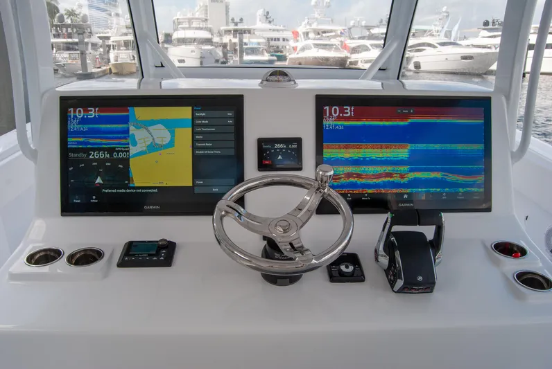  Yacht Photos Pics Helm of 2025 Front Runner 43 Catamaran with dual navigation screens and steering wheel.