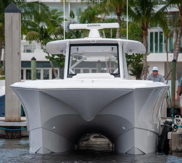  Yacht Photos Pics 2025 Front Runner 43 Catamaran docked, featuring sleek design and Garmin equipment.