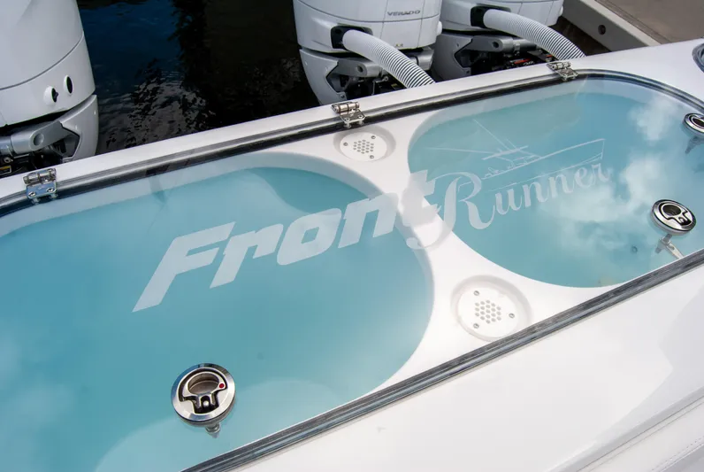  Yacht Photos Pics 2025 Front Runner 43 Catamaran livewell with logo, featuring sleek design and powerful engines.