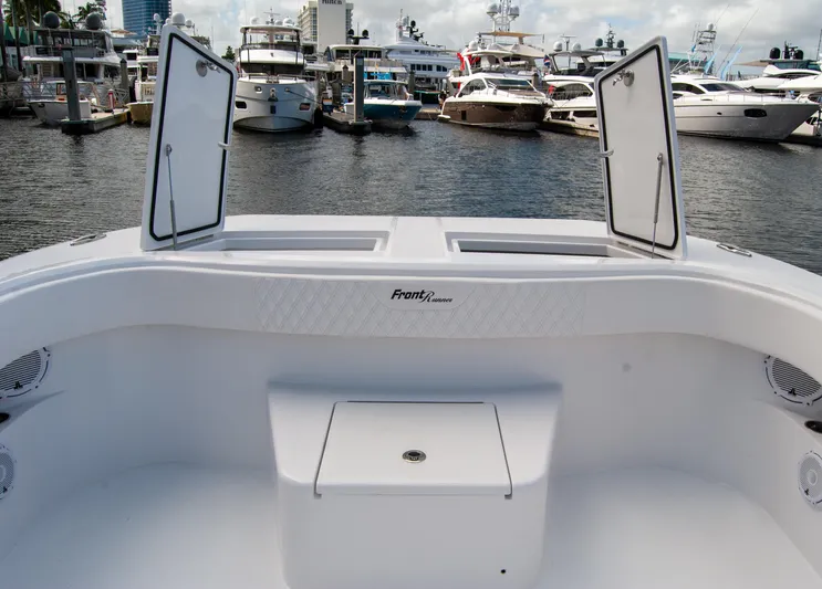  Yacht Photos Pics 2025 Front Runner 43 Catamaran docked at marina, open storage compartments visible.