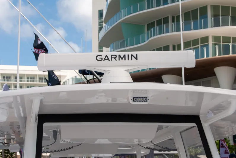  Yacht Photos Pics 2025 Front Runner 43 Catamaran with Garmin radar, modern architecture in background.