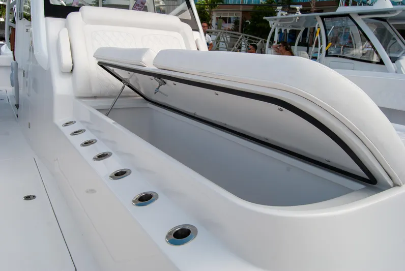  Yacht Photos Pics 2025 Front Runner 43 Catamaran with open storage compartment and sleek white design.