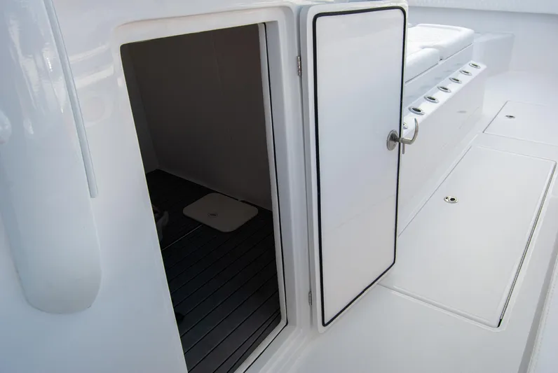  Yacht Photos Pics 2025 Front Runner 43 Catamaran interior access door with sleek white design.