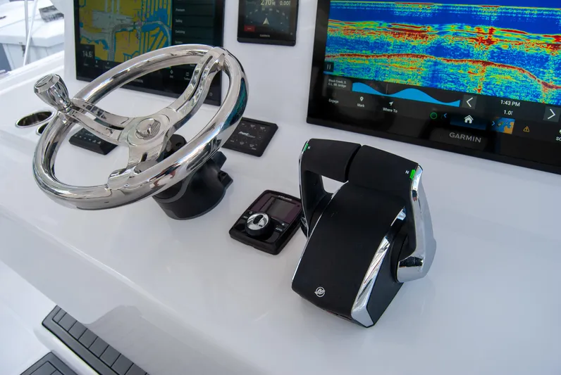  Yacht Photos Pics Steering console of 2025 Front Runner 43 Catamaran with advanced navigation displays.