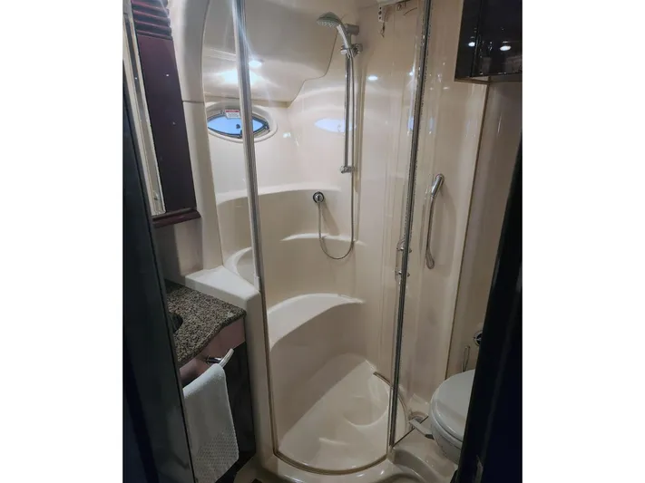  Yacht Photos Pics Luxurious bathroom in 2007 Sea Ray 52 Sedan Bridge yacht with modern shower and amenities.