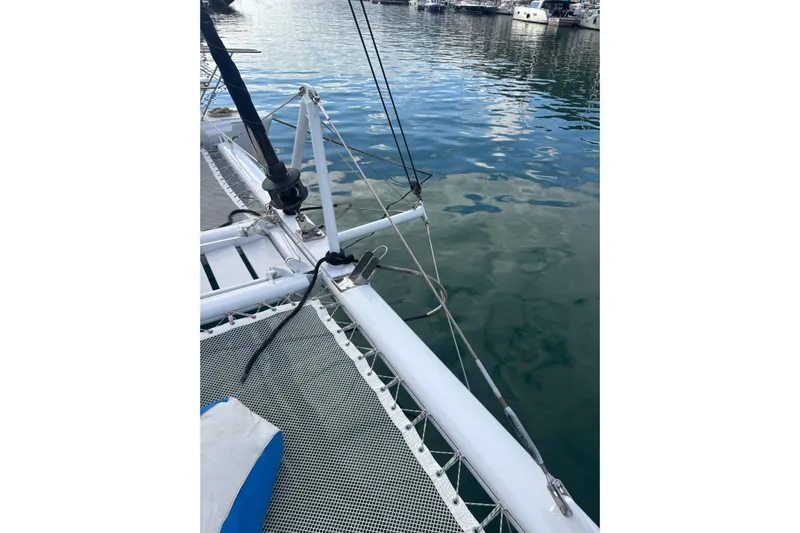  Yacht Photos Pics Kelsall 58 KSS catamaran deck view, 2009 model, docked in calm marina waters.