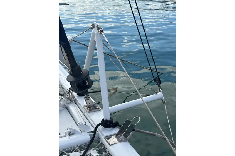  Yacht Photos Pics Close-up of 2009 Kelsall 58 KSS yacht rigging and calm water reflection.