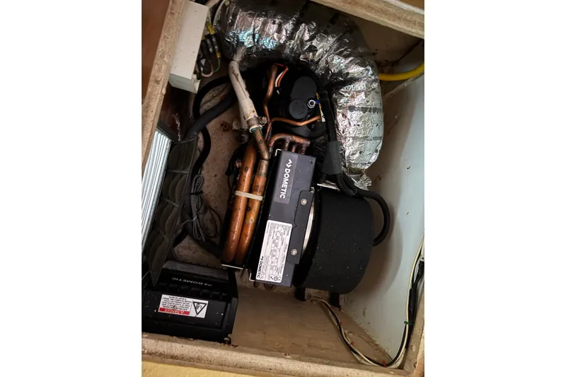  Yacht Photos Pics Engine compartment of a 2009 Kelsall 58 KSS with visible components and wiring.